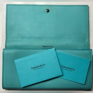 Large original Tiffany & Co wallet with original cleaning instructions and tags!